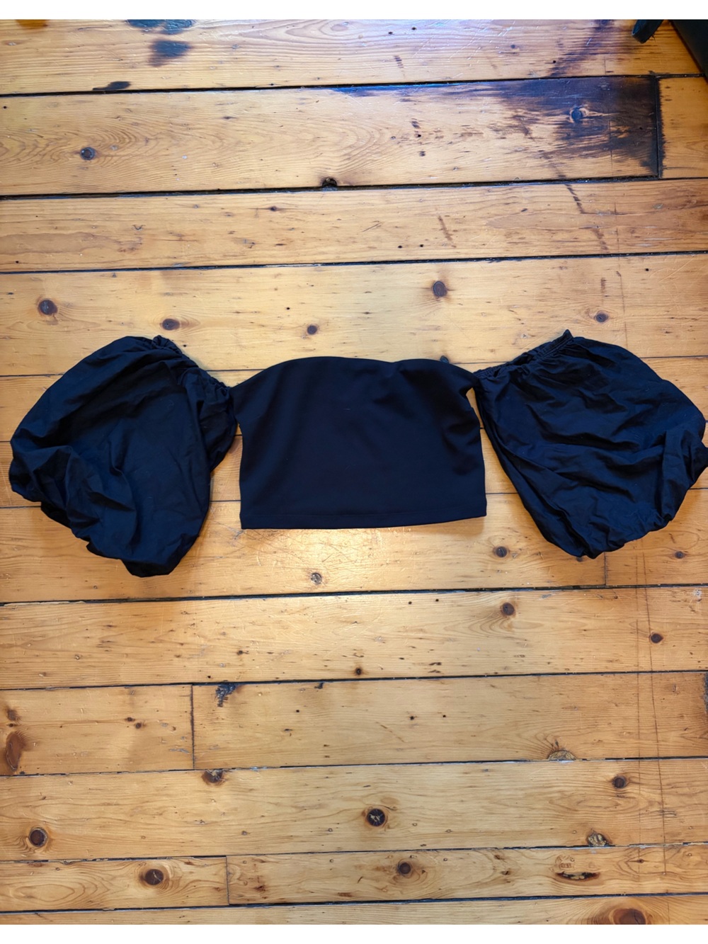 Black top with puffy shoulders